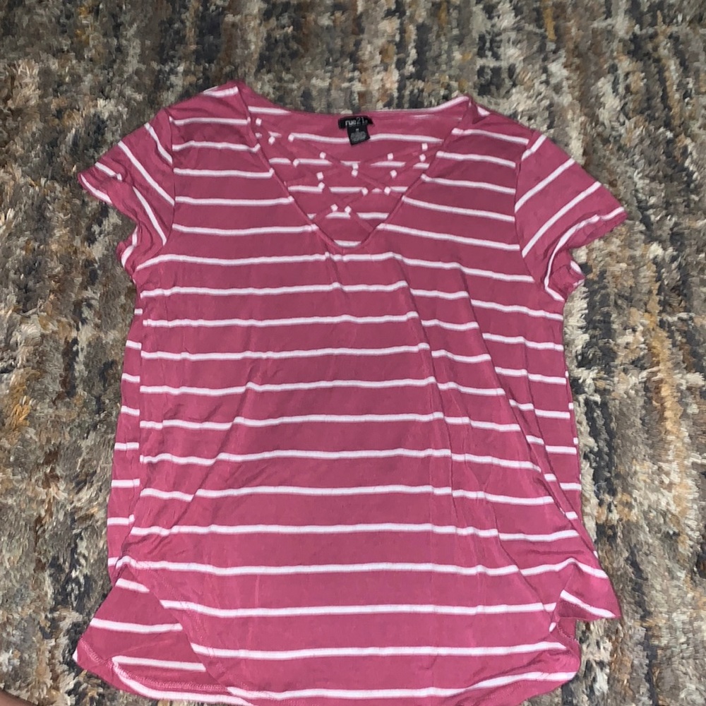 pink with white tripped v-neck shirt